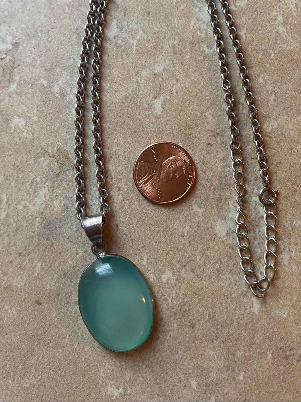 Sea foam/ turquoise colored gemstone and sterling silver pendant